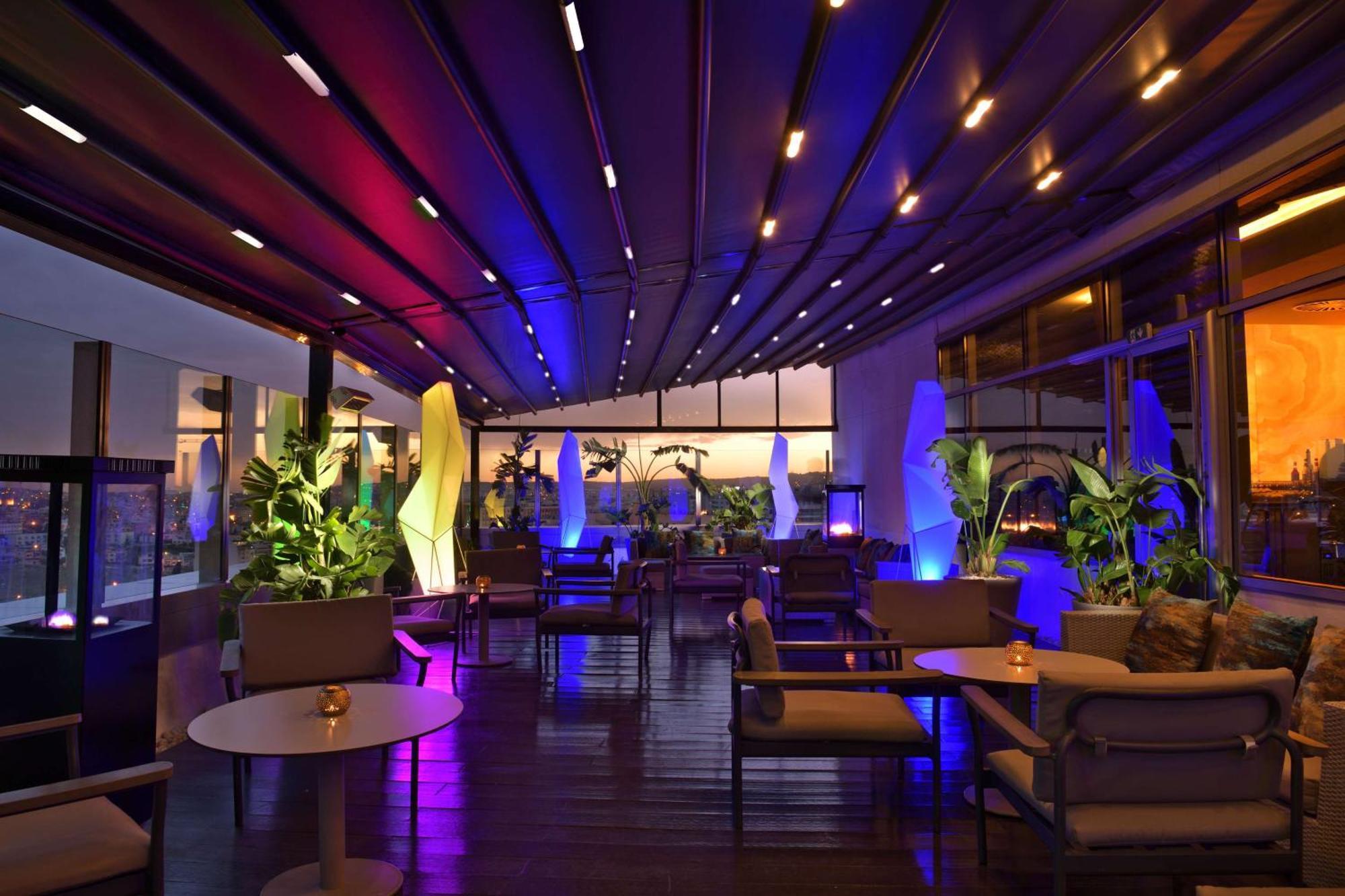 希尔顿丹吉尔市中心酒店公寓 外观 照片 The interior of the lounge