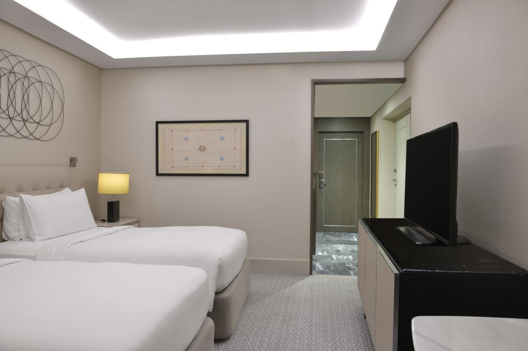 希尔顿丹吉尔市中心酒店公寓 外观 照片 A room at the hotel