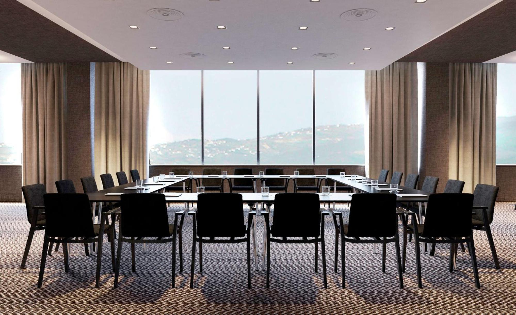 希尔顿丹吉尔市中心酒店公寓 外观 照片 Meeting room