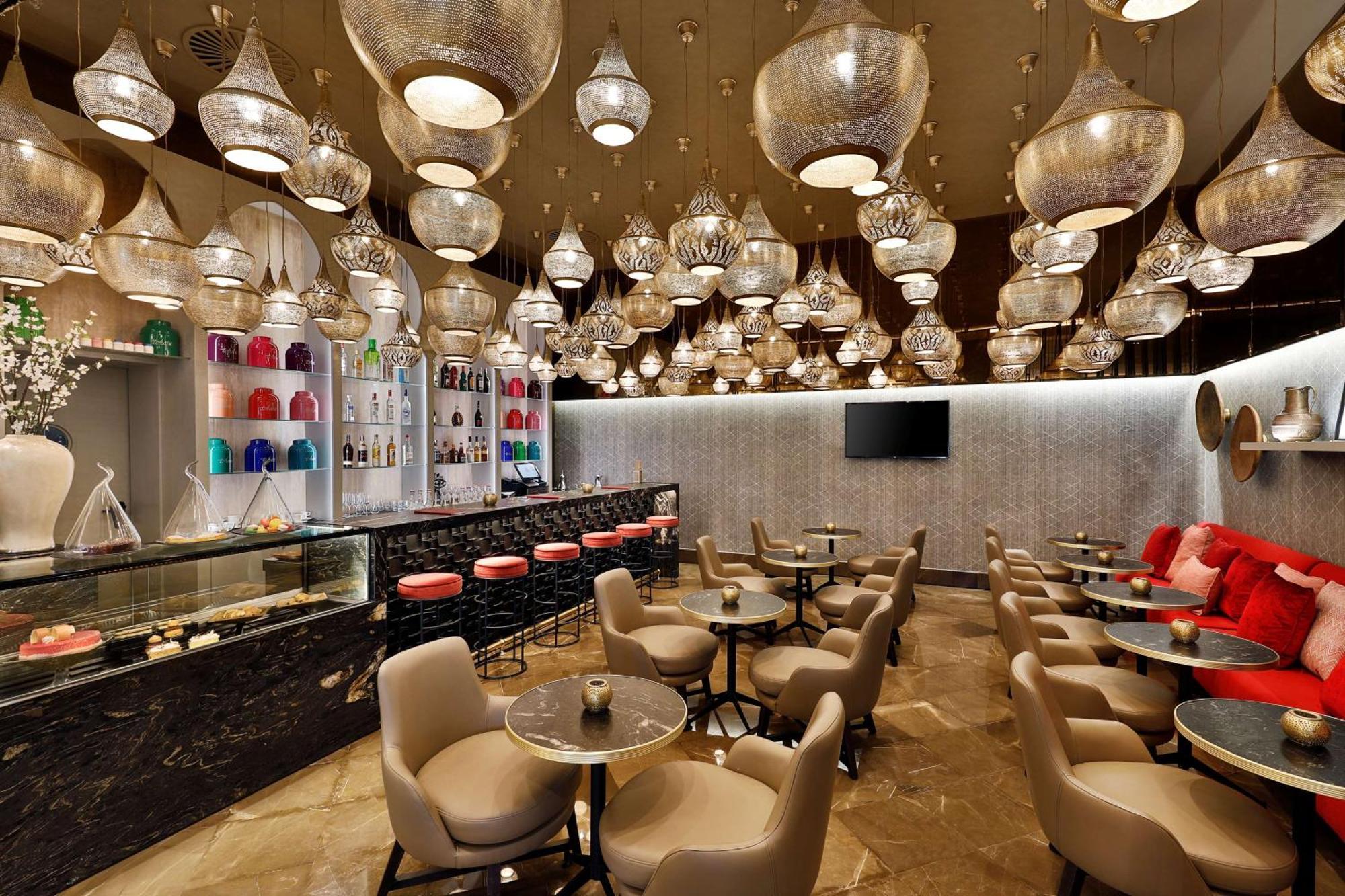 希尔顿丹吉尔市中心酒店公寓 外观 照片 The interior of the lounge