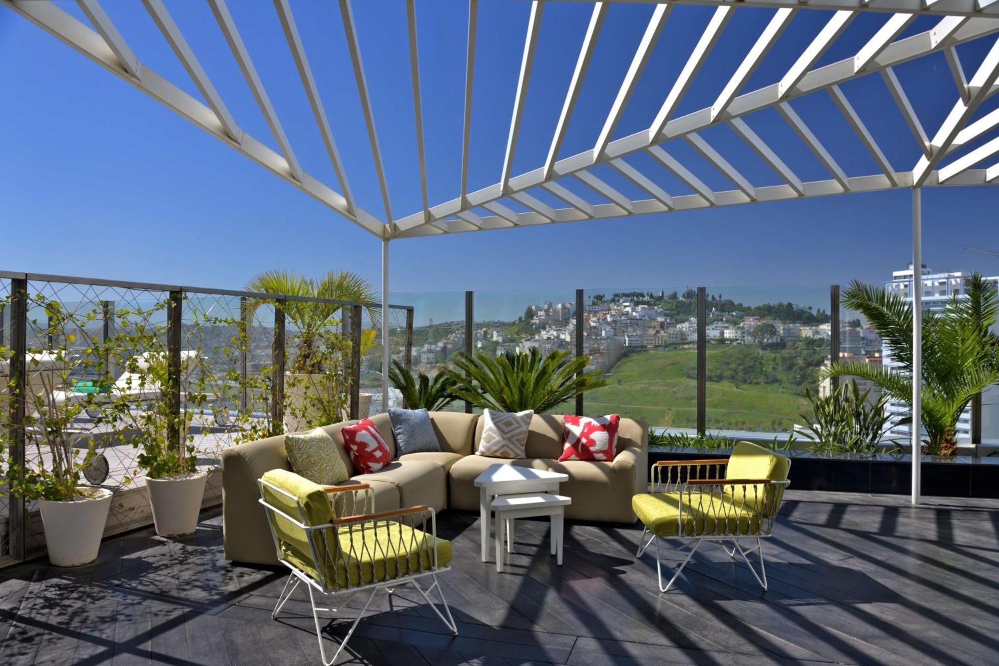 希尔顿丹吉尔市中心酒店公寓 外观 照片 Rooftop garden