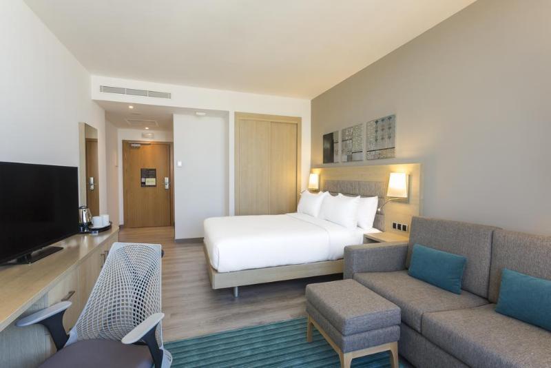 希尔顿丹吉尔市中心酒店公寓 外观 照片 A room at the hotel